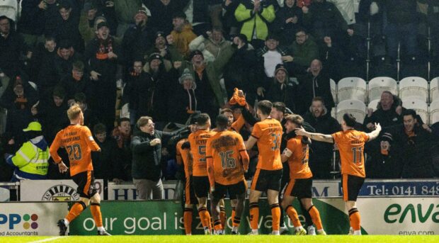 Louis Moult takes the acclaim of the United faithful.