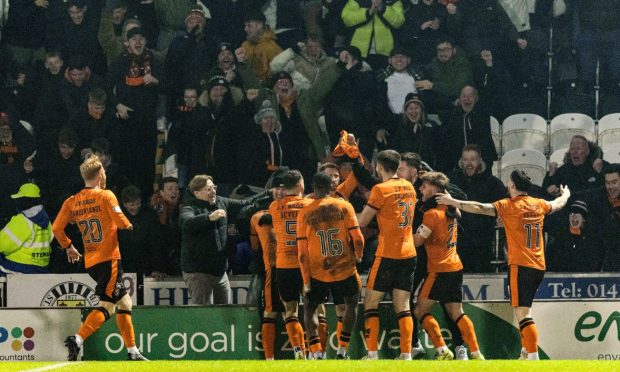 The celebrations among the Dundee United players and fans at St Mirren.