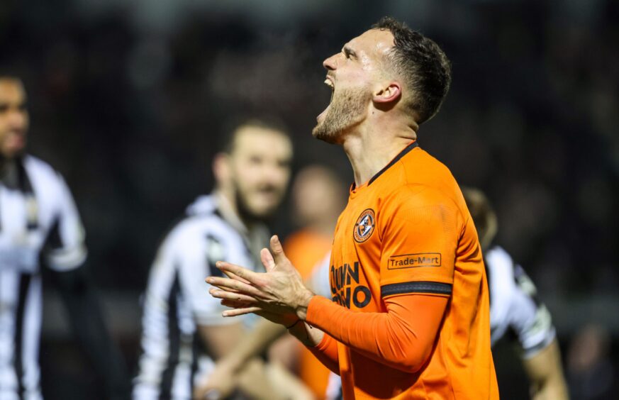 Vicko Sevelj, a warrior during Dundee United's recent run of games, roars with delight at full-time