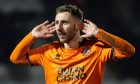 Louis Moult encourages the Dundee United fans to sing his song.