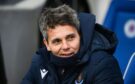 St Johnstone head coach, Simo Valakari in the dugout at Ibrox.