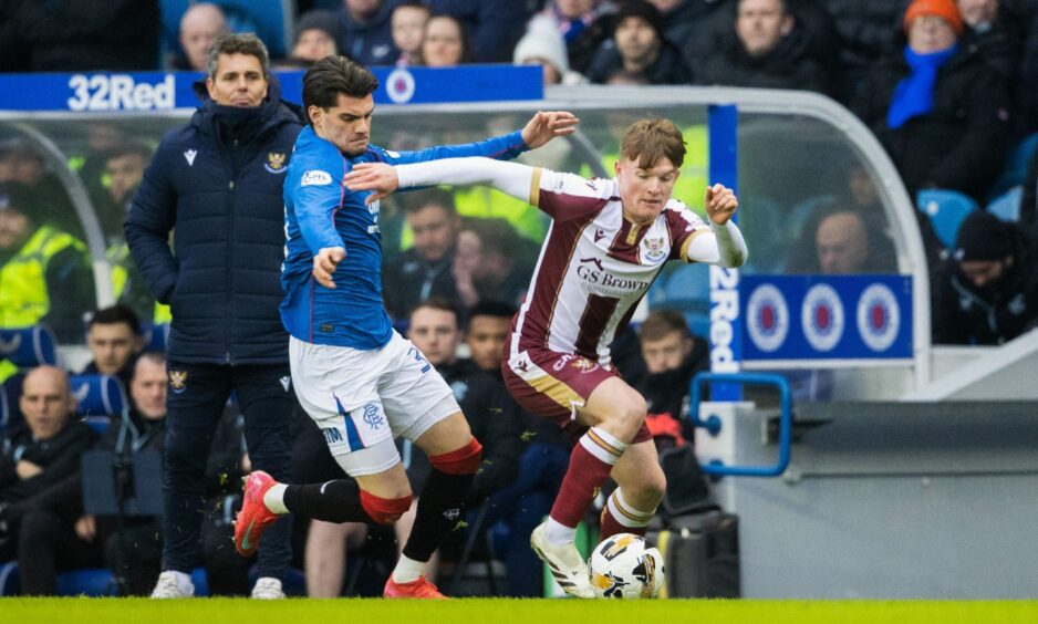 Rangers' Ianis Hagi and St Johnstone's Fran Franczak in action.