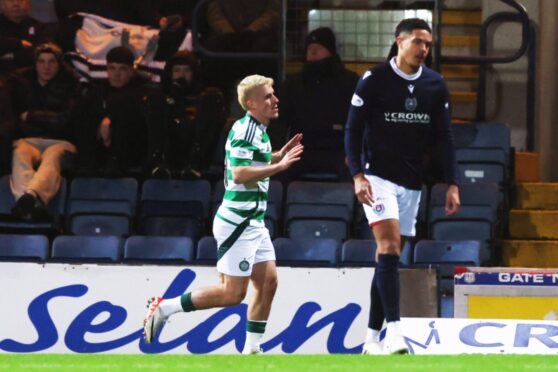 Luke McCowan scores for Celtic against Dundee