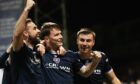 Aaron Donnelly enjoys his goal against Celtic. Image: Paul Devlin/SNS