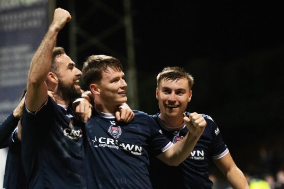 Aaron Donnelly enjoys his goal against Celtic. Image: Paul Devlin/SNS