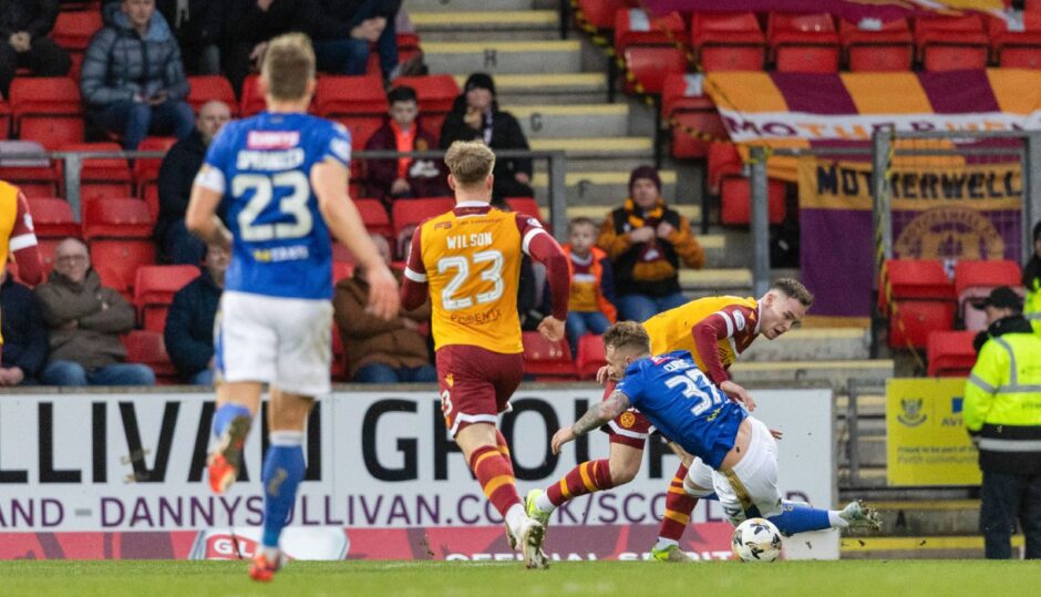 St Johnstone's Sam Curtis goes down in the box and claims for a penalty.