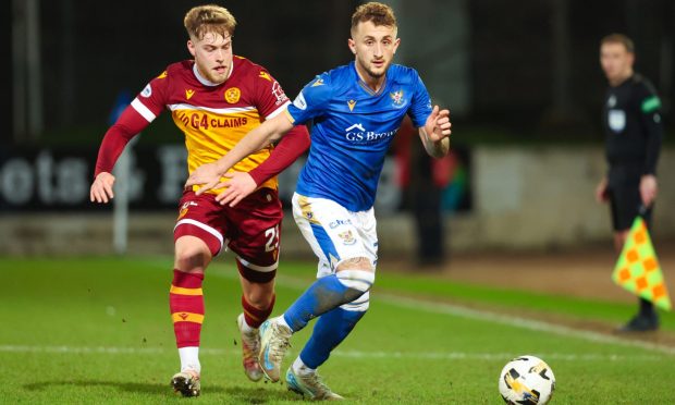 New St Johnstone loan defender, Sam Curtis in action against Motherwell.