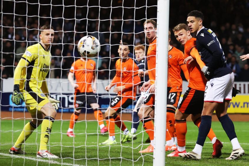 Simon Murray scores against Dundee United