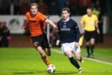 Fin Robertson takes on Dundee United