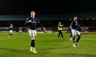 Simon Murray celebrates a derby win at Dens Park.