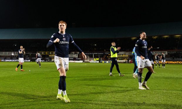 Simon Murray celebrates a derby win at Dens Park.