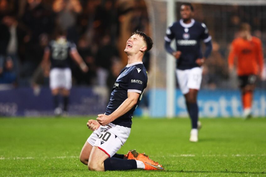 Time for celebration - Aaron Donnelly enjoys the moment. Image: Ross MacDonald/SNS