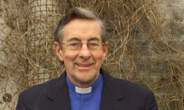 The Rev. Alec Strickland at Dairsie Parish Church when he retired in 2005. Image: DC Thomson.