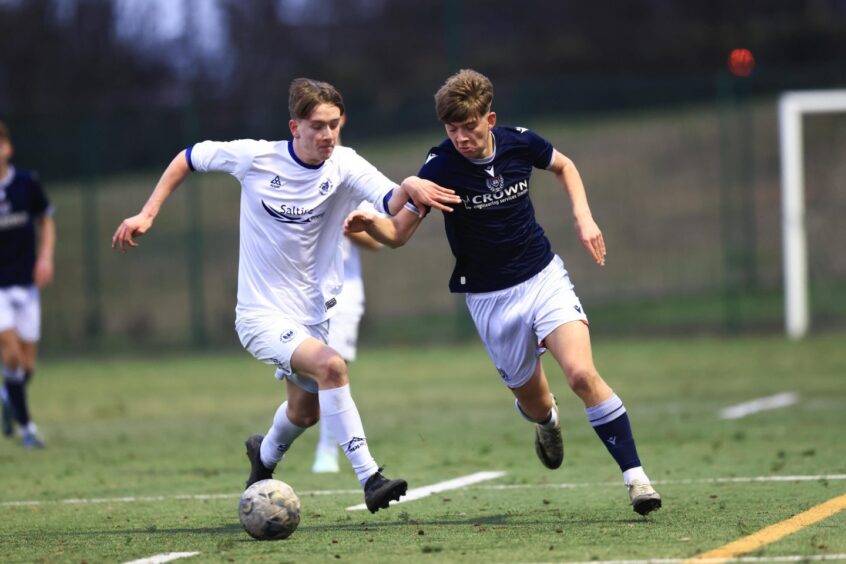 Chase Scott takes on Banks O' Dee at RPC as Dundee U/18s ran out 2-0 winners. Image: David Young