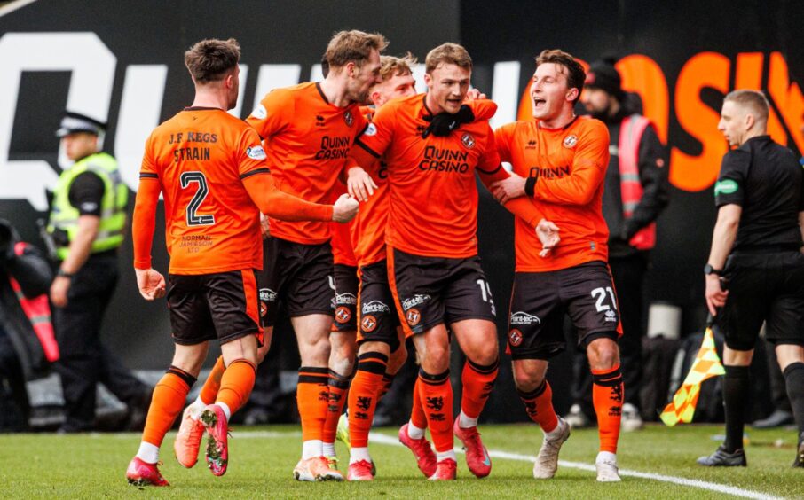 Dundee United's Sam Dalby is congratulated following his superbly take opener.