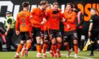 Dundee United's Sam Dalby is congratulated following his superbly take opener.