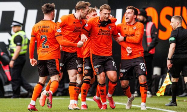 Dundee United's Sam Dalby is congratulated following his superbly take opener.