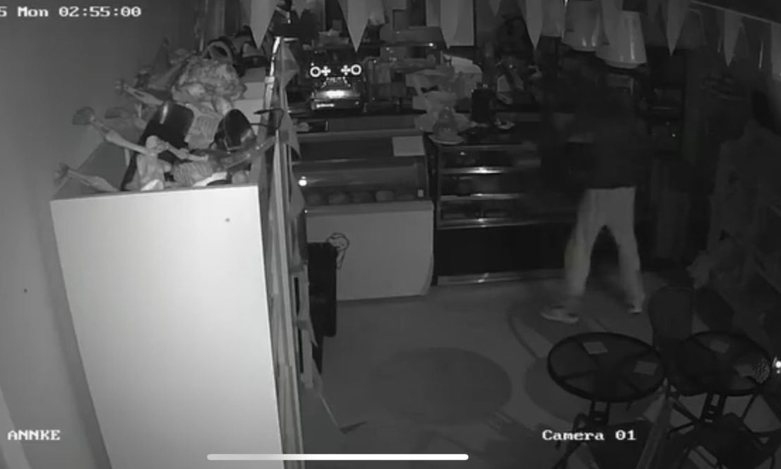 CCTV captures the thief inside the cafe.