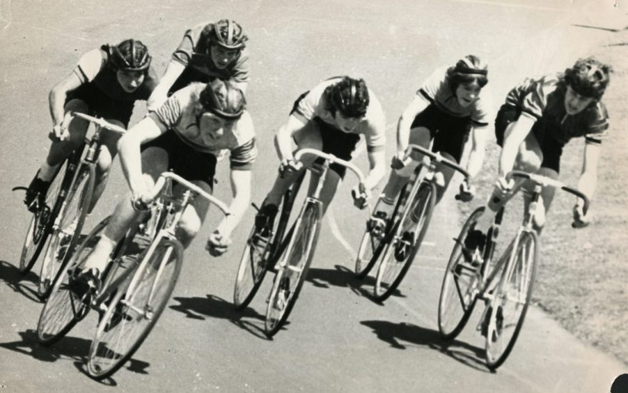 six entrants in a schoolboy cycle race round a bend at Dundee's Caird Park in June 1975.