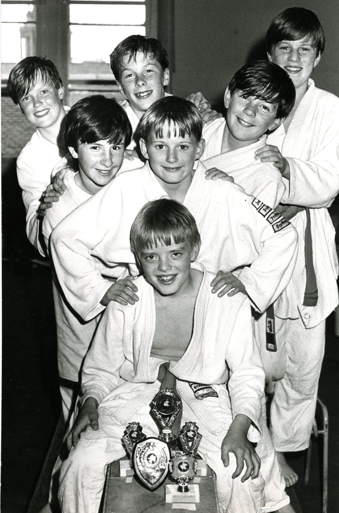 Dundee YMCA Judo Club members show off their trophies in June 1985.