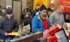 Customers waiting to be served at Pepe's Piri Piri in Albert Street, Dundee. Image Naveed Sarwar.jpg