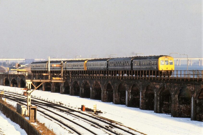 DMU on the Tay Rail Bridge. 