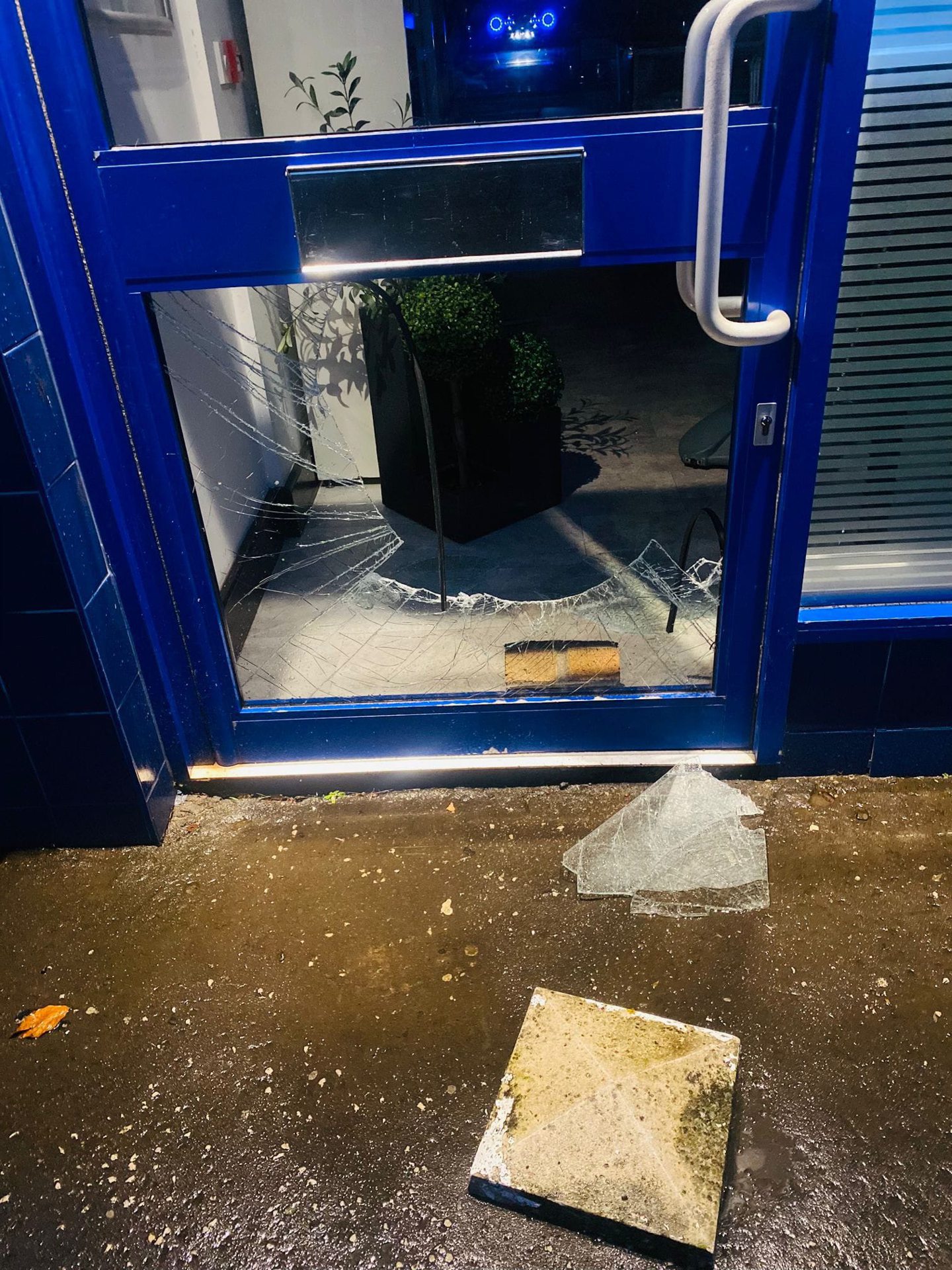 Smashed front door of the Buckhaven cafe.