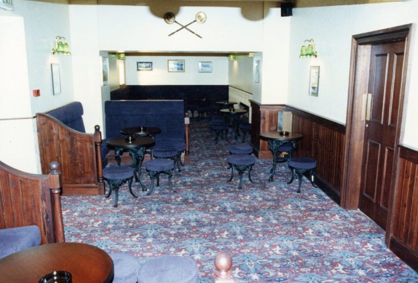 The seating and tables in the lounge area at Sandy's Bar in 1991.