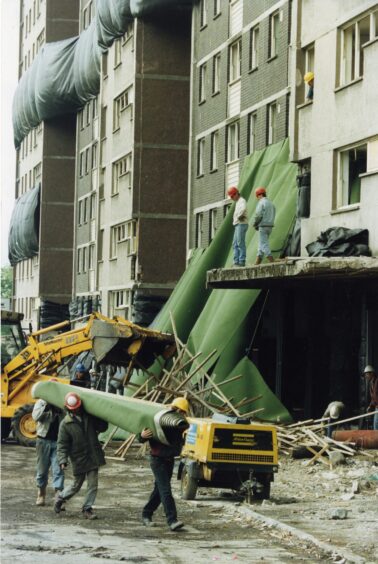 Demolition work beginning at the Ardler multis in Dundee. 