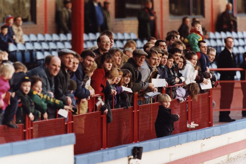 Watching greyhound racing at Dens in Dundee in January 1995.