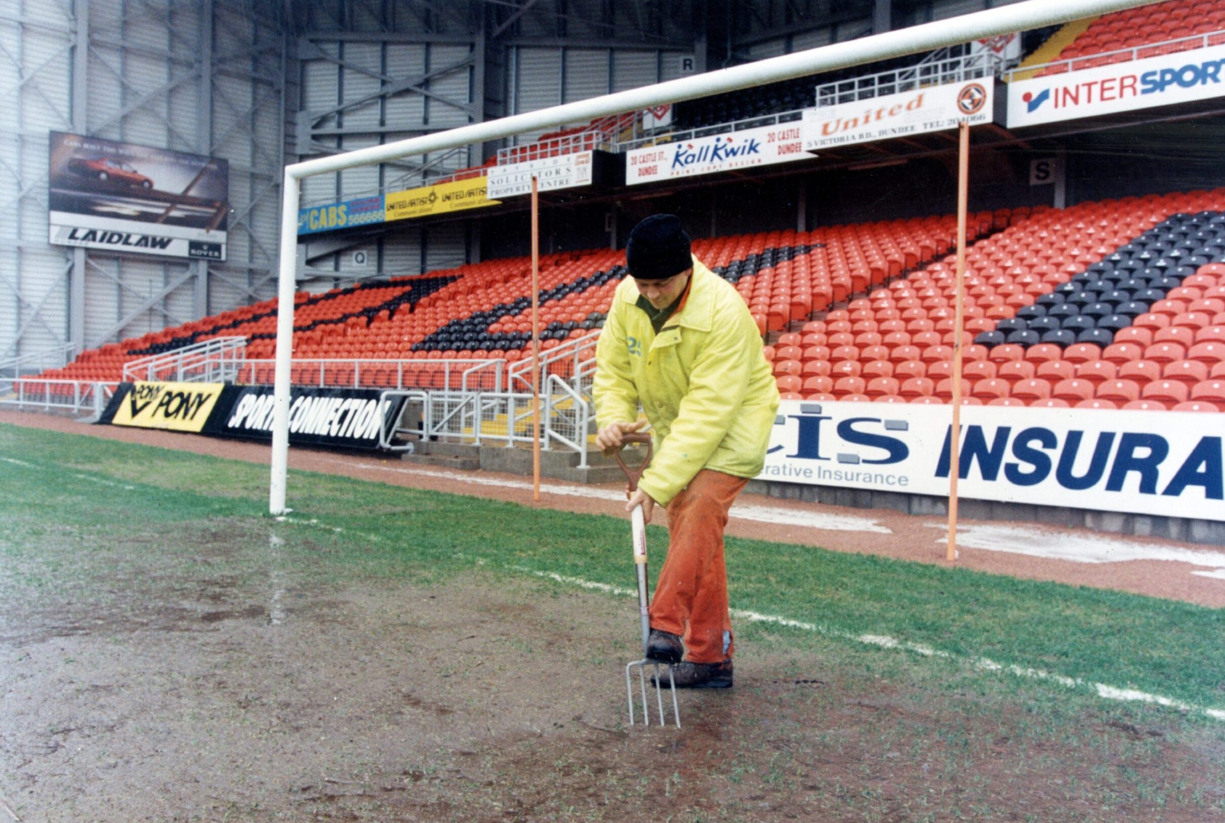 John Monks trying his best to prevent a wash-out. at Tannadice Park.