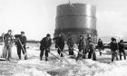 Snow-clearing at Station Park in February 1978 with the Carseview Road gasometer in the background. Image: Tay Pix