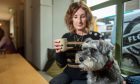Alison Brant enjoys coffee with her dog, Rudi, at Eastfield on Dundee's Perth Road. Image: Kim Cessford.