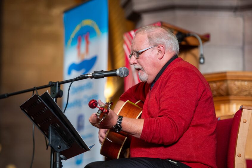 Performer during Forfar dementia centres celebration.