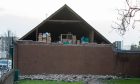 The Gable end of the St Clair Pharmacy in Kirkcaldy was destroyed. Image: Kenny Smith/DC Thomson