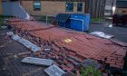 A wall succumbed to the high winds at Carnegie Primary School in Dunfermline on
Friday. Image: Kenny Smith/DC Thomson