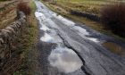 Potholes on the Loch Glow Road on the outskirts of Kelty.