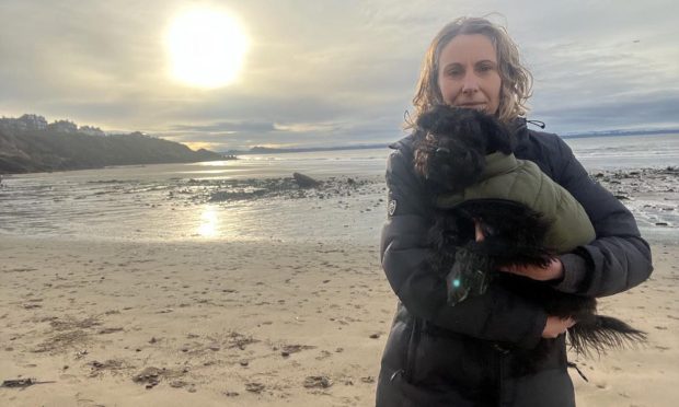 Families writer Cheryl Peebles on Kinghorn beach with schnoodle Ivy. Image: Cheryl Peebles