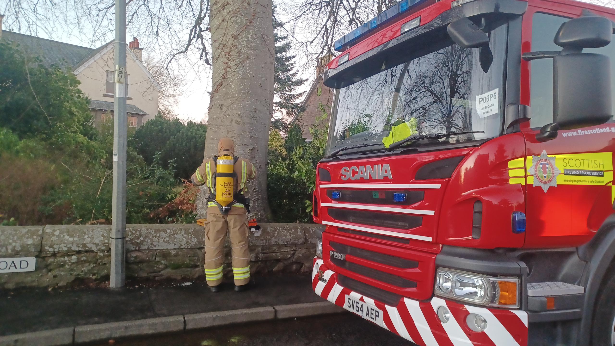 A firefighter on North Latch Road, Brechin.