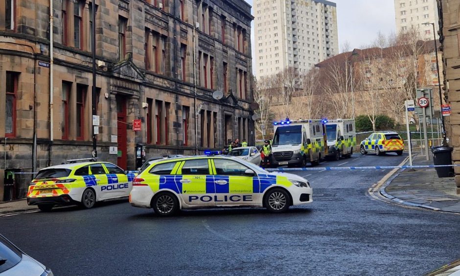 Part of Victoria Road in Dundee city centre was taped off by police. 