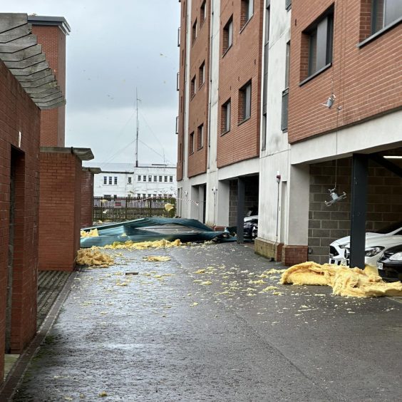 roof debris in the courtyard of the Dundee building