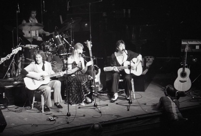 Paul McCartney and the band on stage in Dundee during their Wings over the World tour.