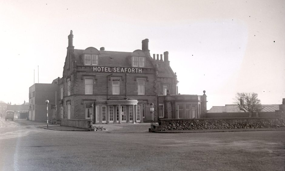 The exterior of the mansion house, with the sign stating Hotel Seaforth 