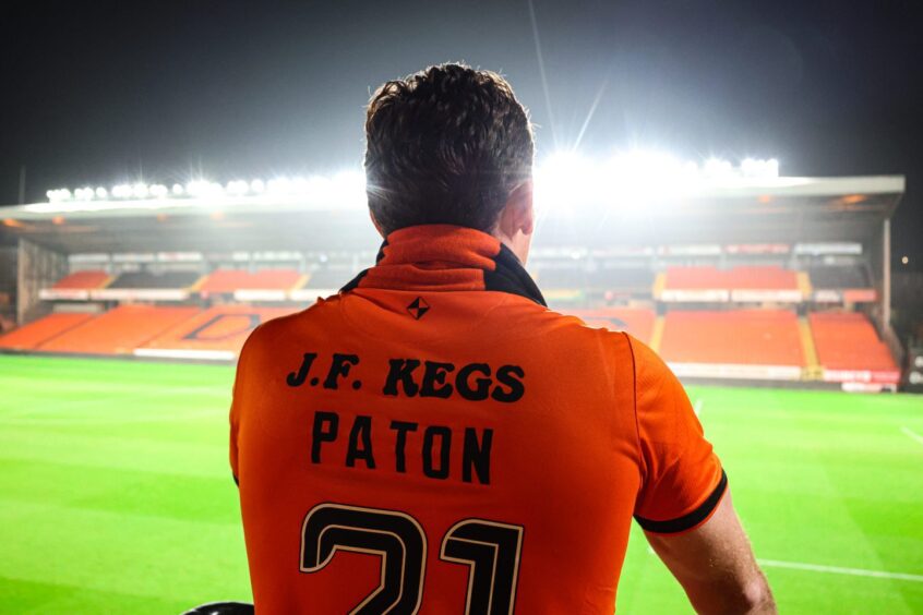 Ruari Paton, who will wear No.21, takes in his new surroundings at Tannadice.