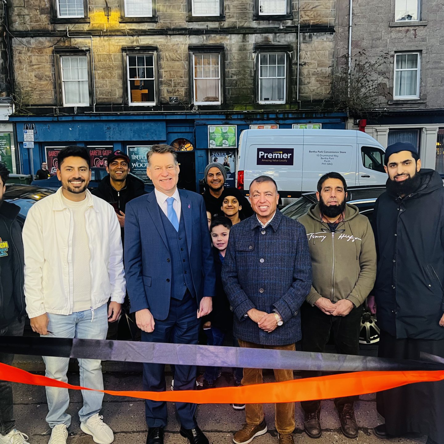 Amar and his family with Murdo Fraser.