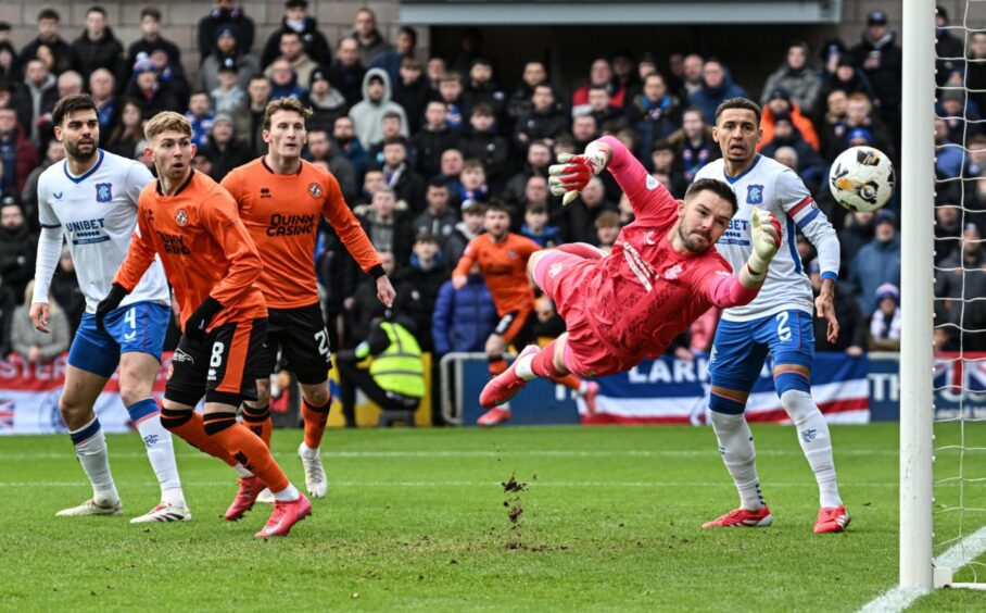 Dundee United striker Sam Dalby's header strikes the post against Rangers