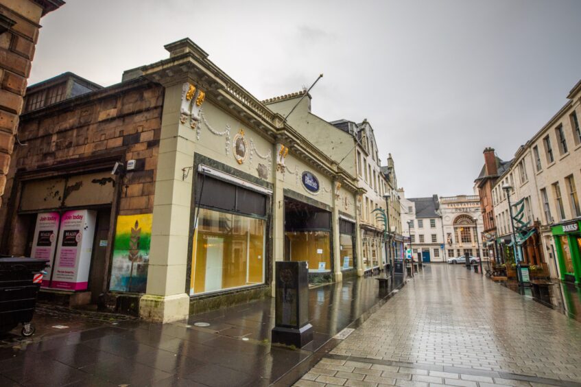 McEwens of Perth exterior, looking along St John Street to Salutation Hotel