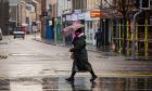 One woman braving Storm Eowyn in Perth on Friday. Image: Steve MacDougall/DC Thomson