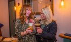 Proprietor Pauline Russell and customer Louise Cramb enjoy a couple of cocktails newly opened Tayview Bar. 
 Image: Steve MacDougall/DC Thomson