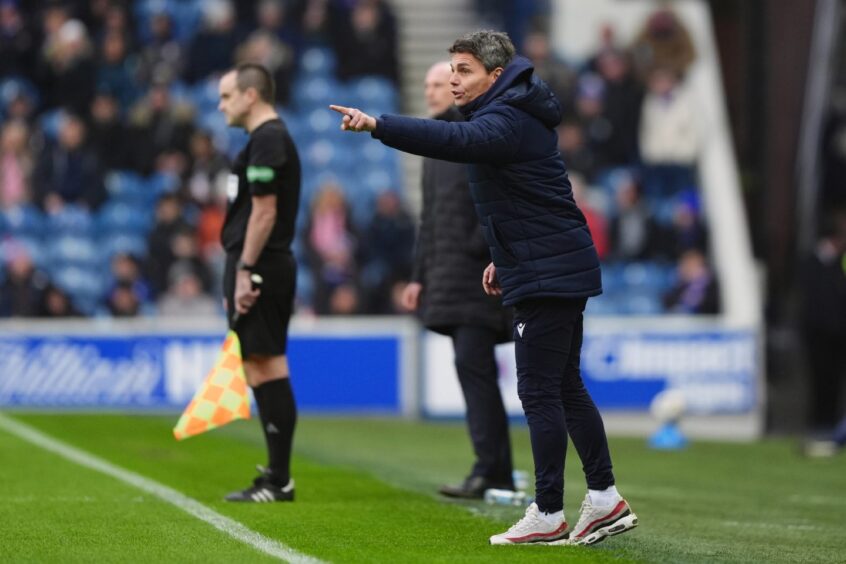 St Johnstone manager Simo Valakari issues instructions from the Ibrox touchline. 